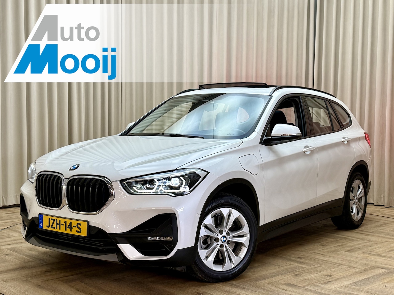 BMW X1 - xDrive25e Panoramadak / Afn. Trekhaak / Navi Pro / LED / Cruise / Camera / PDC V&A / 17'' - AutoWereld.nl