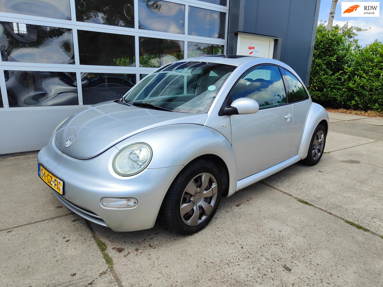 Volkswagen New Beetle - 1.9 TDI Highline 1.9 TDI Highline - AutoWereld.nl