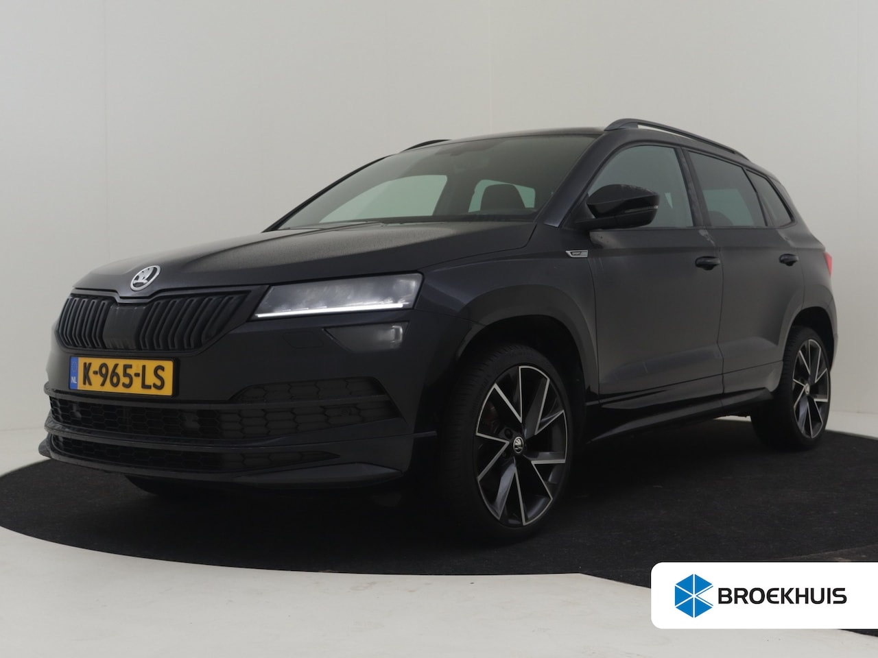 Skoda Karoq - 1.5 TSI ACT Sportline Business 150pk DSG/AUTO | Achteruitrijcamera | Navigatie | Cruise co - AutoWereld.nl