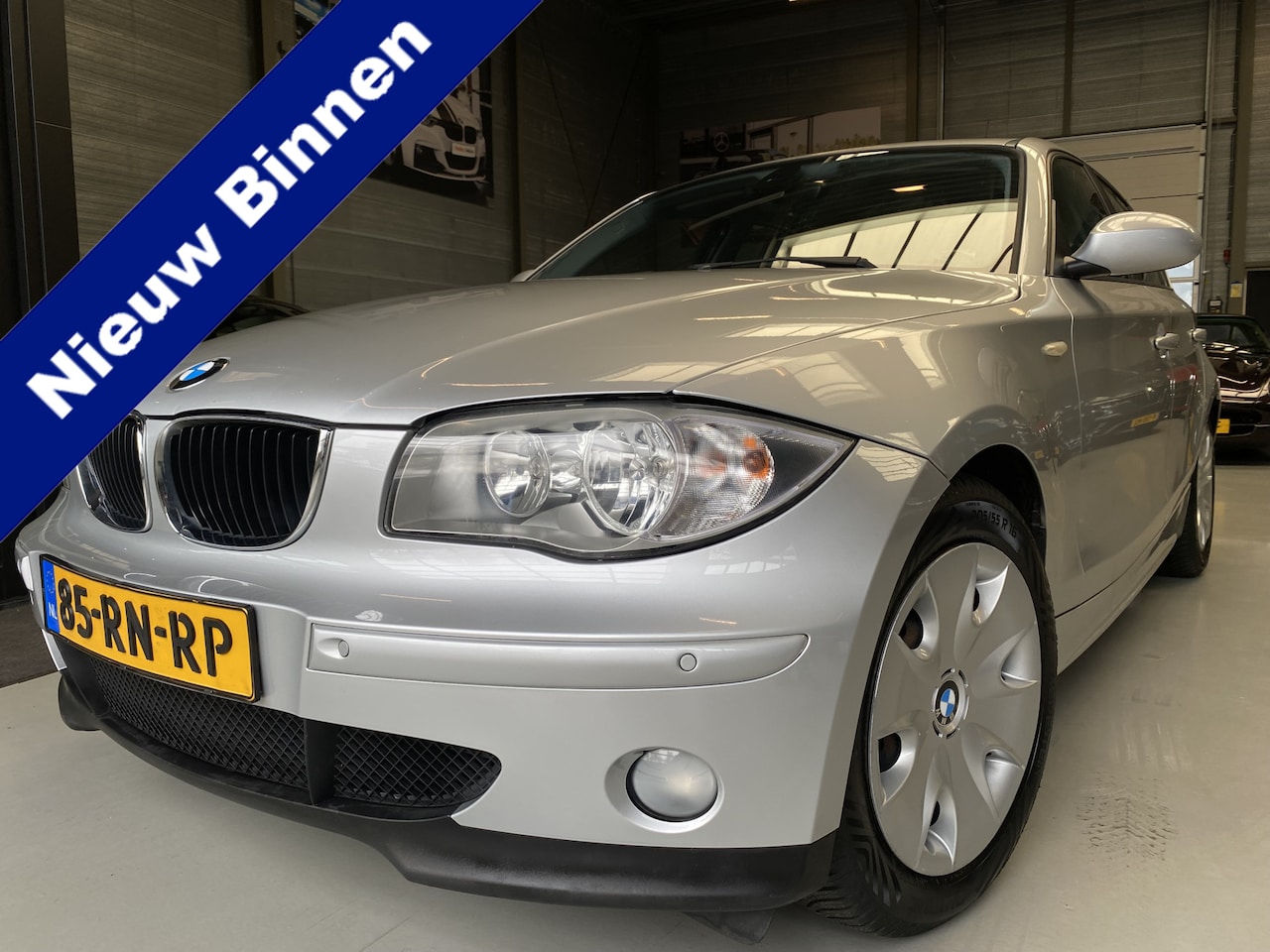 BMW 1-serie - 118i Airco,  Automaat,  Navi - AutoWereld.nl