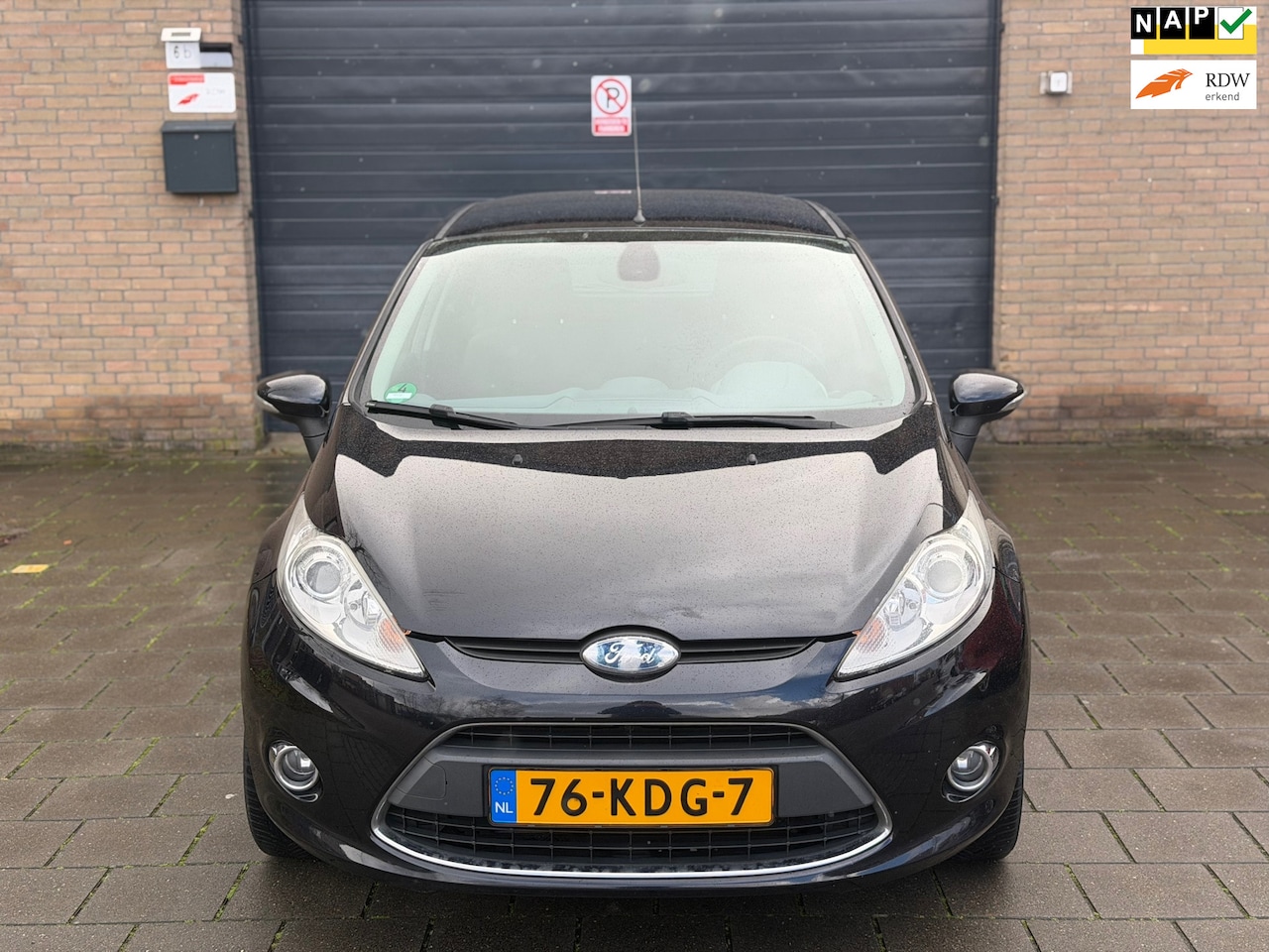 Ford Fiesta - 1.4 Titanium Apk cruise Control Clima elektrisch pakket - AutoWereld.nl