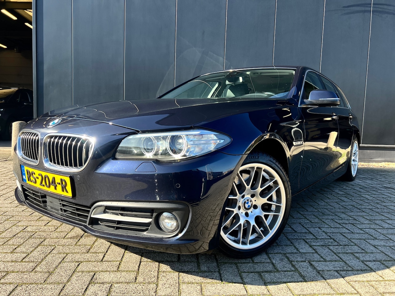 BMW 5-serie Touring - 528i High Exe '14 Aut/Leer/Navi/18'Lmv/Vol - AutoWereld.nl