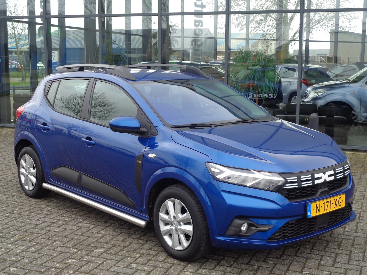 Dacia Sandero - 1.0 TCe 100 Bi-Fuel Expression LPG-G3 Airco Apple/Android Dakrails Sidebars Trekhaak NL auto 1e eigenaar - AutoWereld.nl