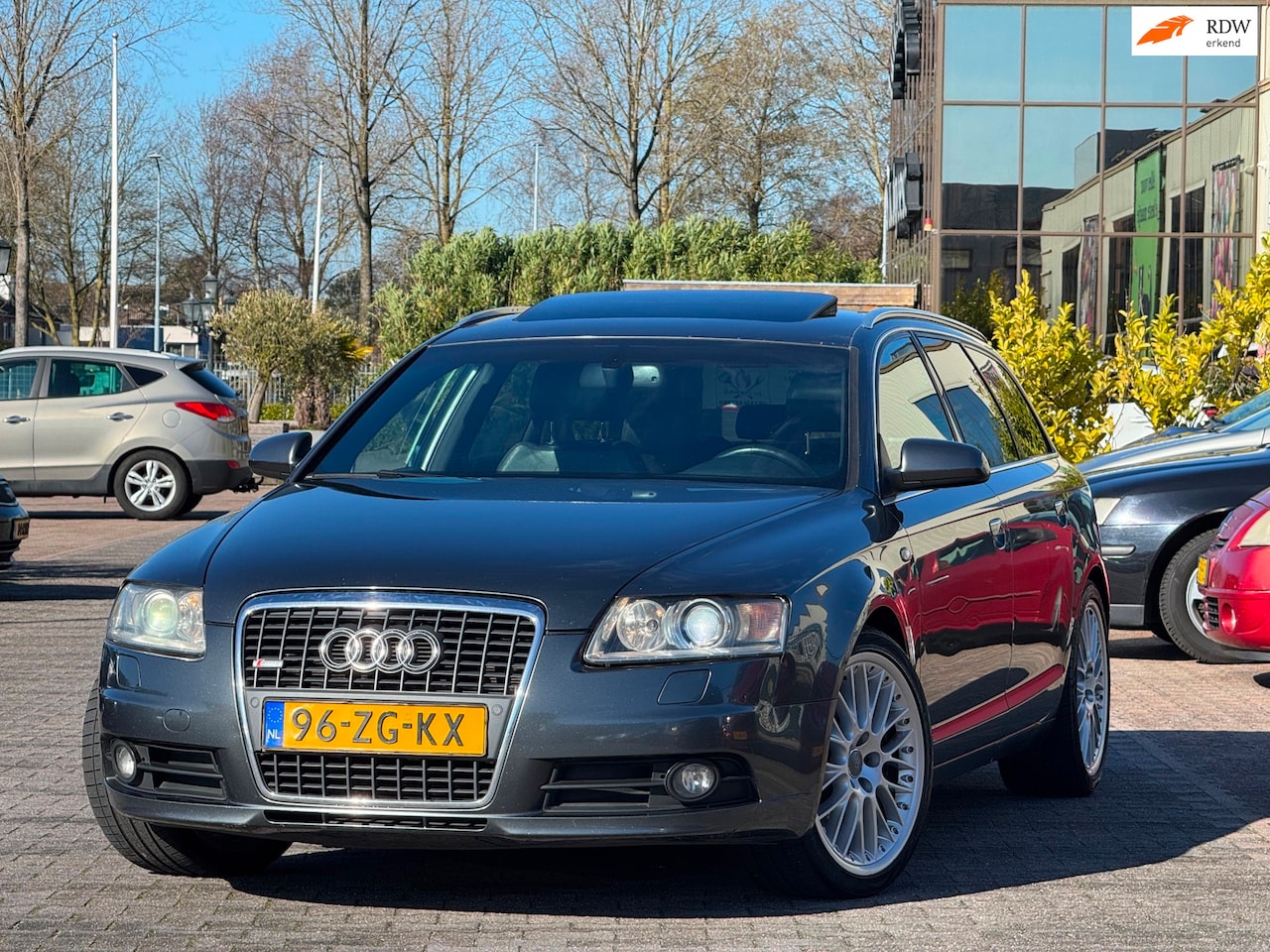 Audi A6 Avant - 3.2 FSI quattro Pro Line | Navigatie | Elektrische stoelen | Parkeersensoren | 19 inch | L - AutoWereld.nl