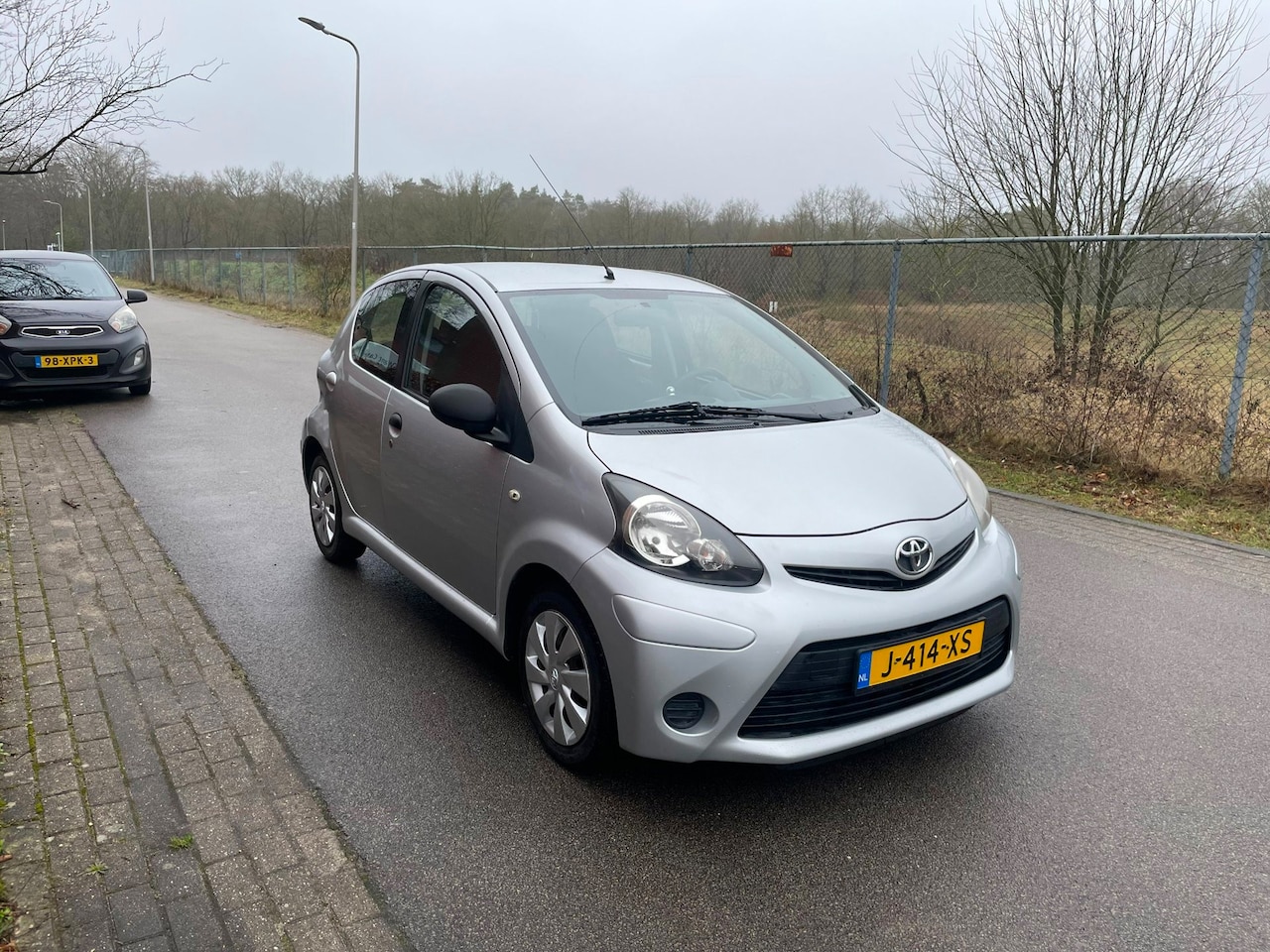 Toyota Aygo - 1.0 VVT-i Comfort Orange [ Kleine Schade ] - AutoWereld.nl