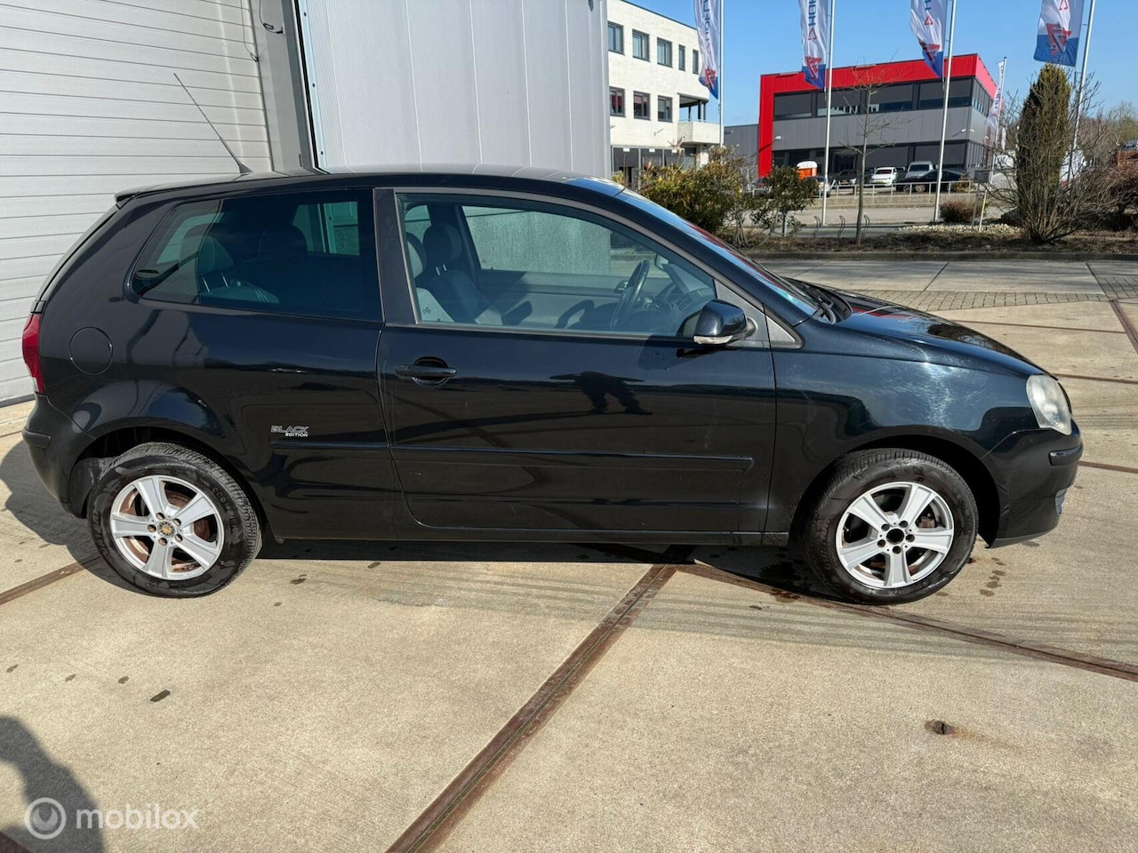 Volkswagen Polo - 1.2 Black Edition - AutoWereld.nl