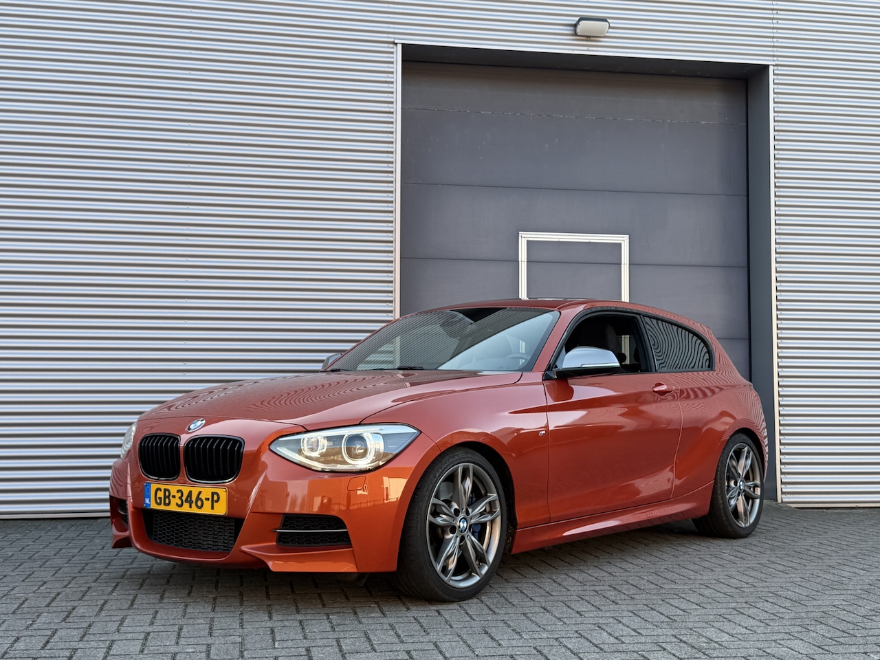 BMW 1-serie - M135i xDrive High Executive I Aut. I 320PK I Schuifdak I 67000 km - AutoWereld.nl