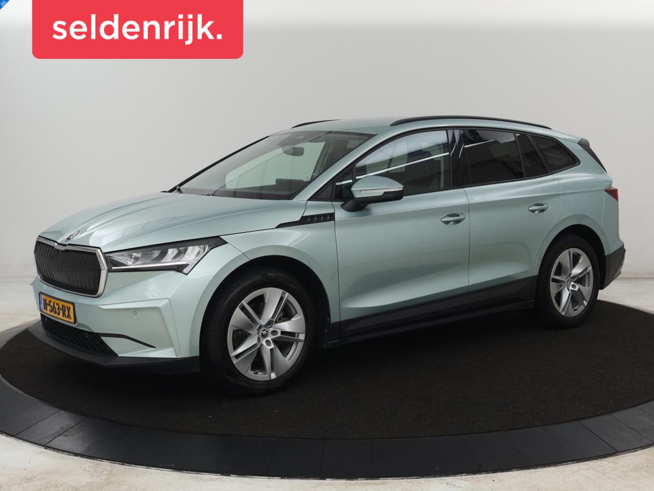 Skoda Enyaq iV - 60 | Warmtepomp | Stoelverwarming | Camera | Keyless | Carplay | Navigatie | Half leder | - AutoWereld.nl