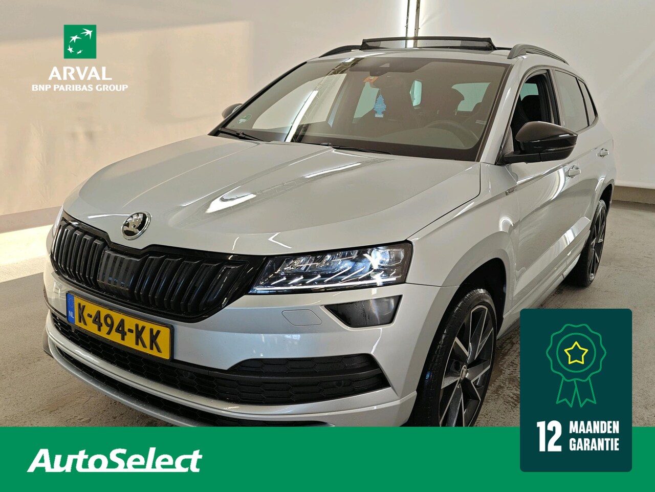 Skoda Karoq - 1.5 TSI 150pk Automaat Sportline Business | Panoramadak | Trekhaak | Comfortpakket | Stoel - AutoWereld.nl