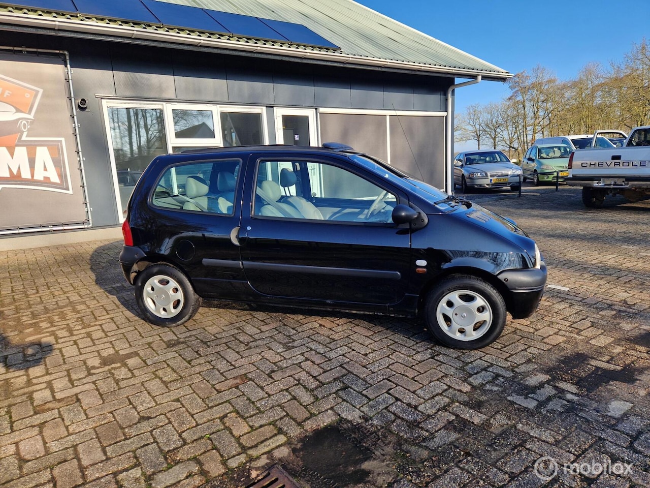 Renault Twingo - 1.2 Initiale Automaat | panorama - AutoWereld.nl