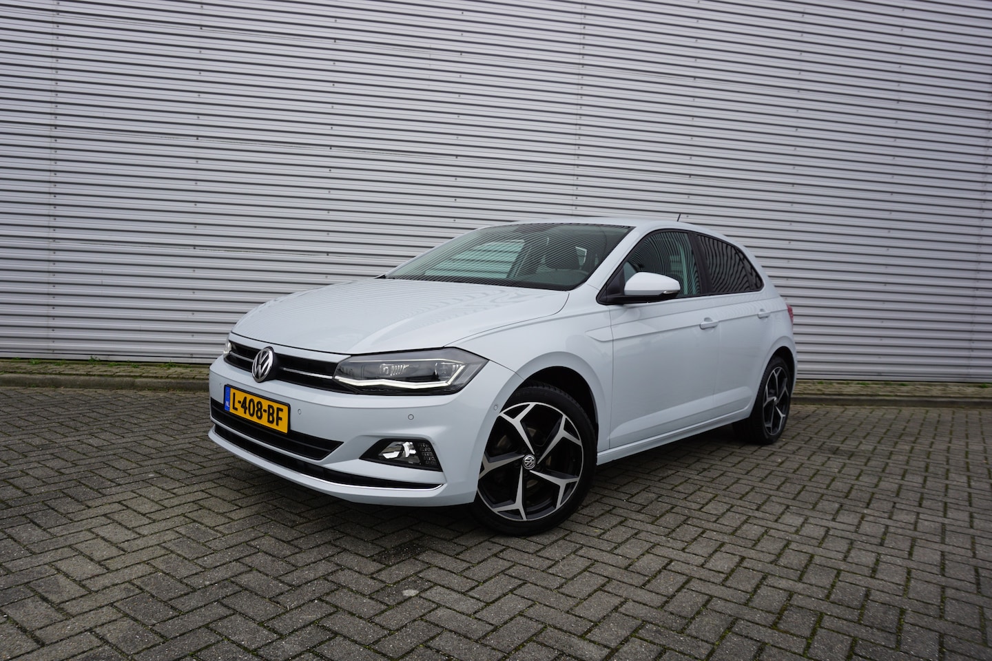 Volkswagen Polo - 1.0 TSI Highline AUTOMAAT - Climate / Navi / Cruise / Camera / Stoelverw. / Lm velgen - AutoWereld.nl