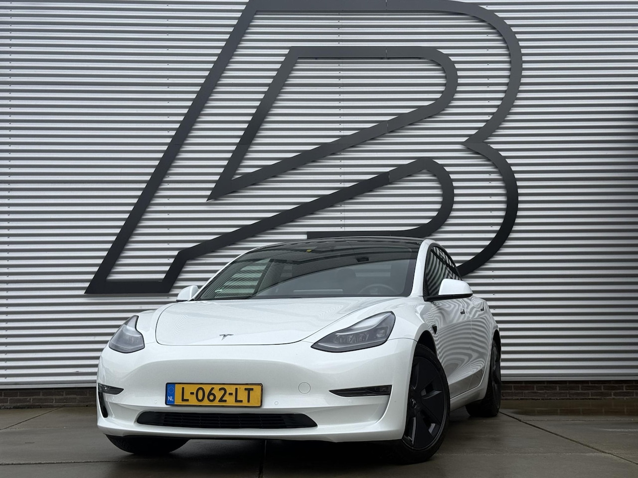 Tesla Model 3 - Long Range RWD Long Range AWD 75 kWh Navi|Pano|Camera|Clima|Cruise|NL-Auto|N.A.P|APK tot 12-2026 - AutoWereld.nl