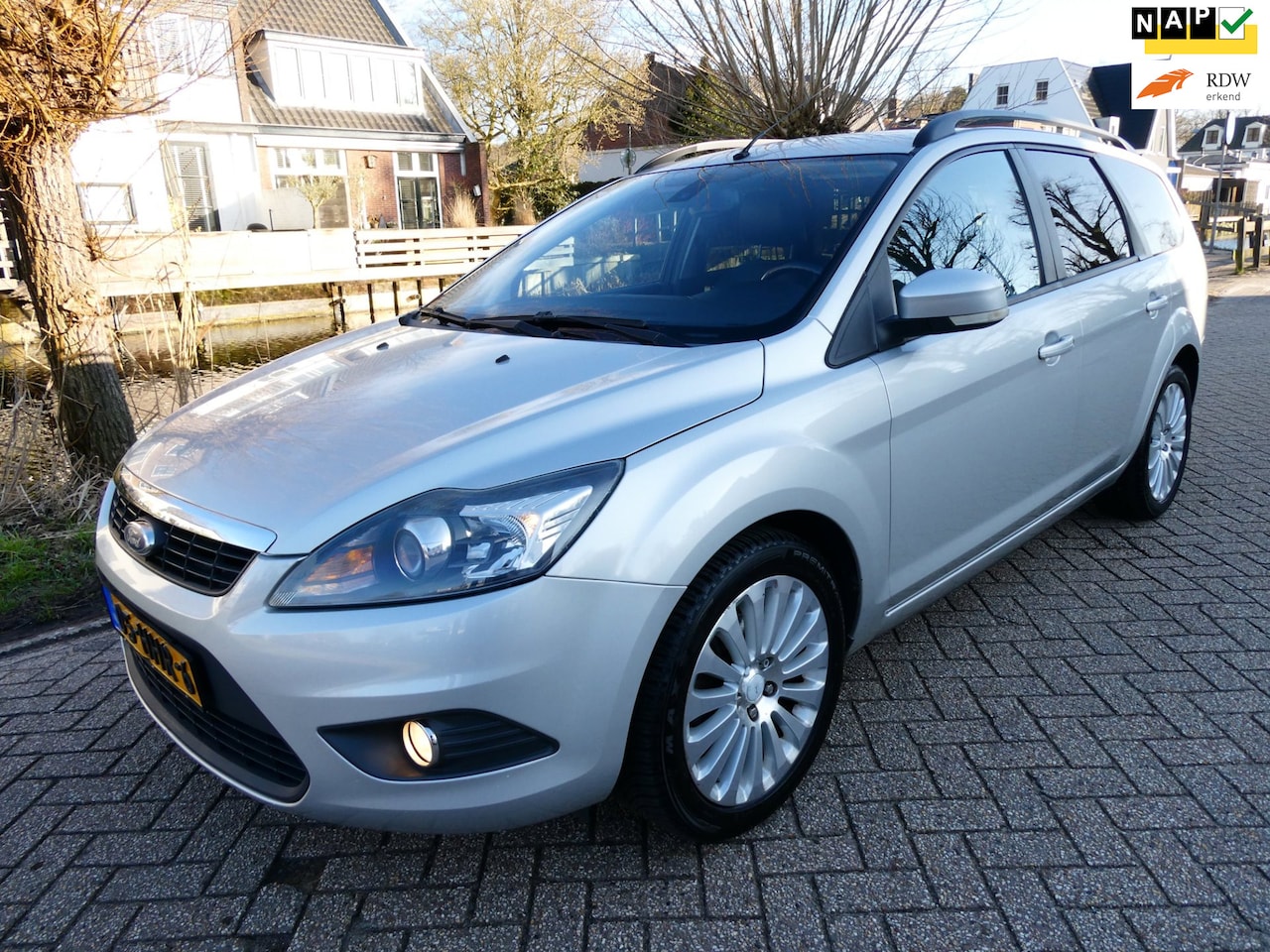 Ford Focus Wagon - 1.6 Titanium 101pk Clima Cruise Navi PDC Historie - AutoWereld.nl