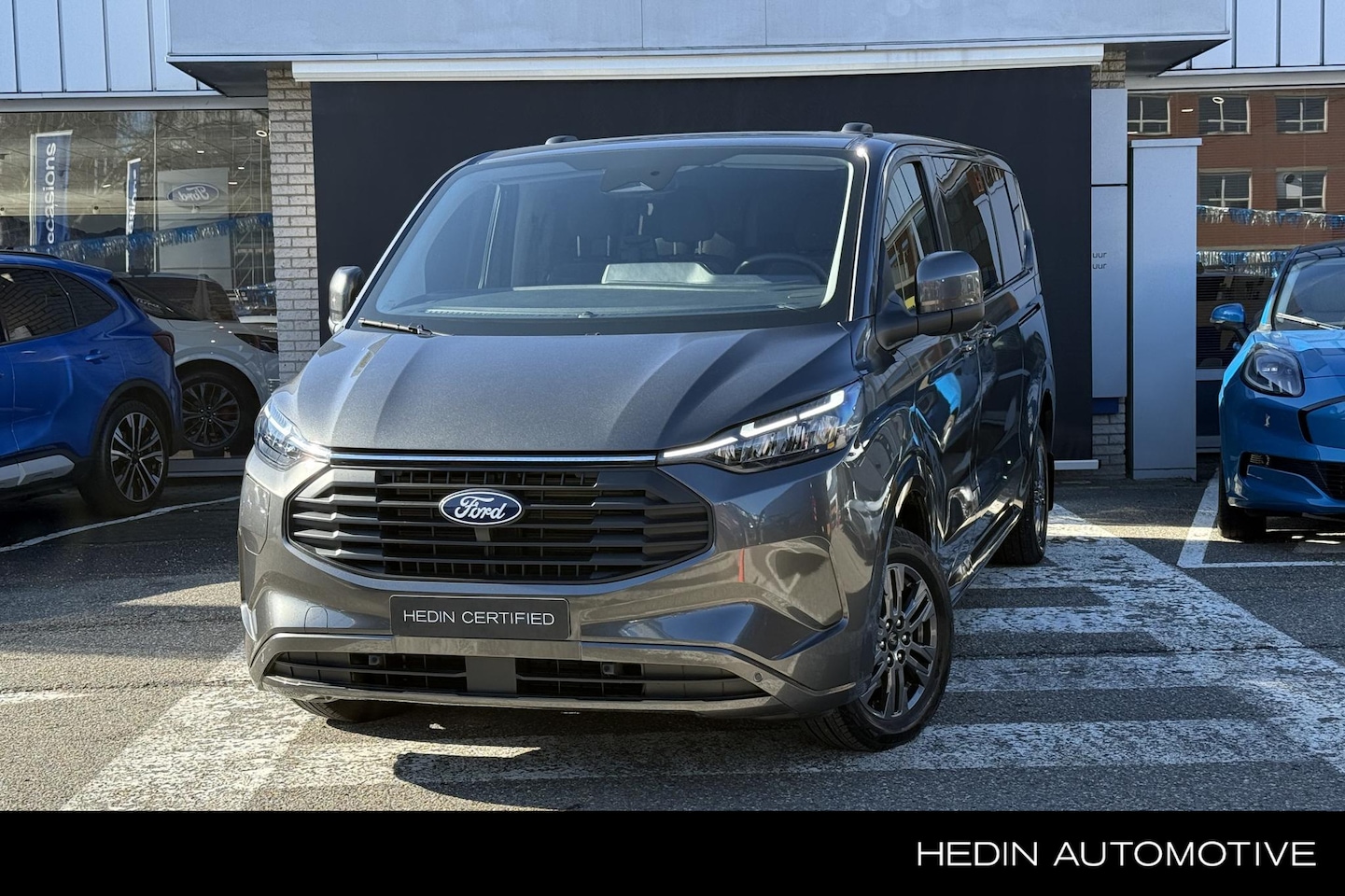 Ford Transit Custom - Kombi 340 2.5 PHEV L2H1 Limited | 9-persoons | Dubbele schuifdeur | Driver Assistance Pack - AutoWereld.nl