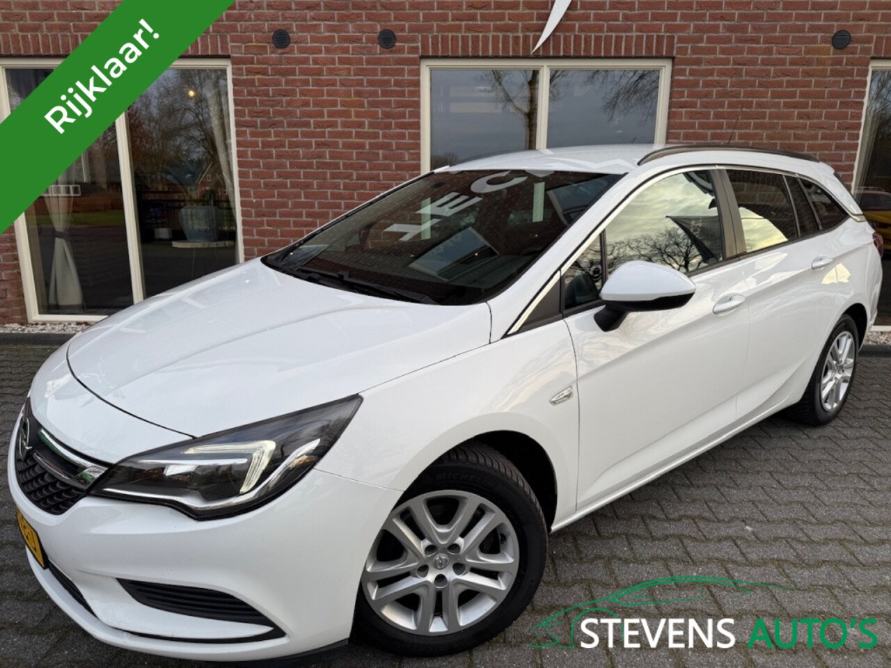 Opel Astra Sports Tourer - 1.0 T. Business 105PK NAVI / AIRCO / CRUISE / PDC / ISOFIX - AutoWereld.nl