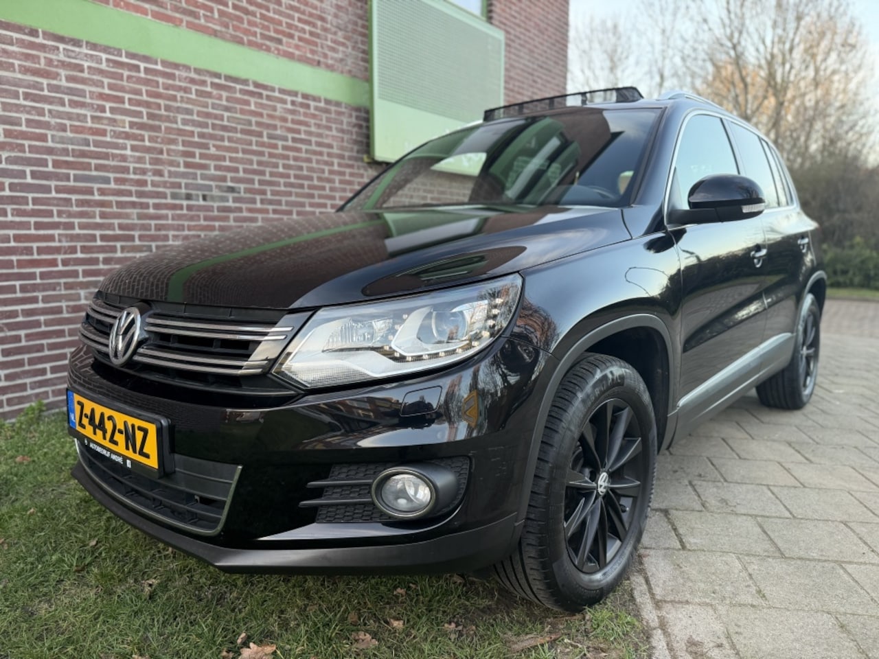 Volkswagen Tiguan - 1.4 TSI Sp&St*2013*Ecc|Cruise|Xenon|Nav|Pano - AutoWereld.nl