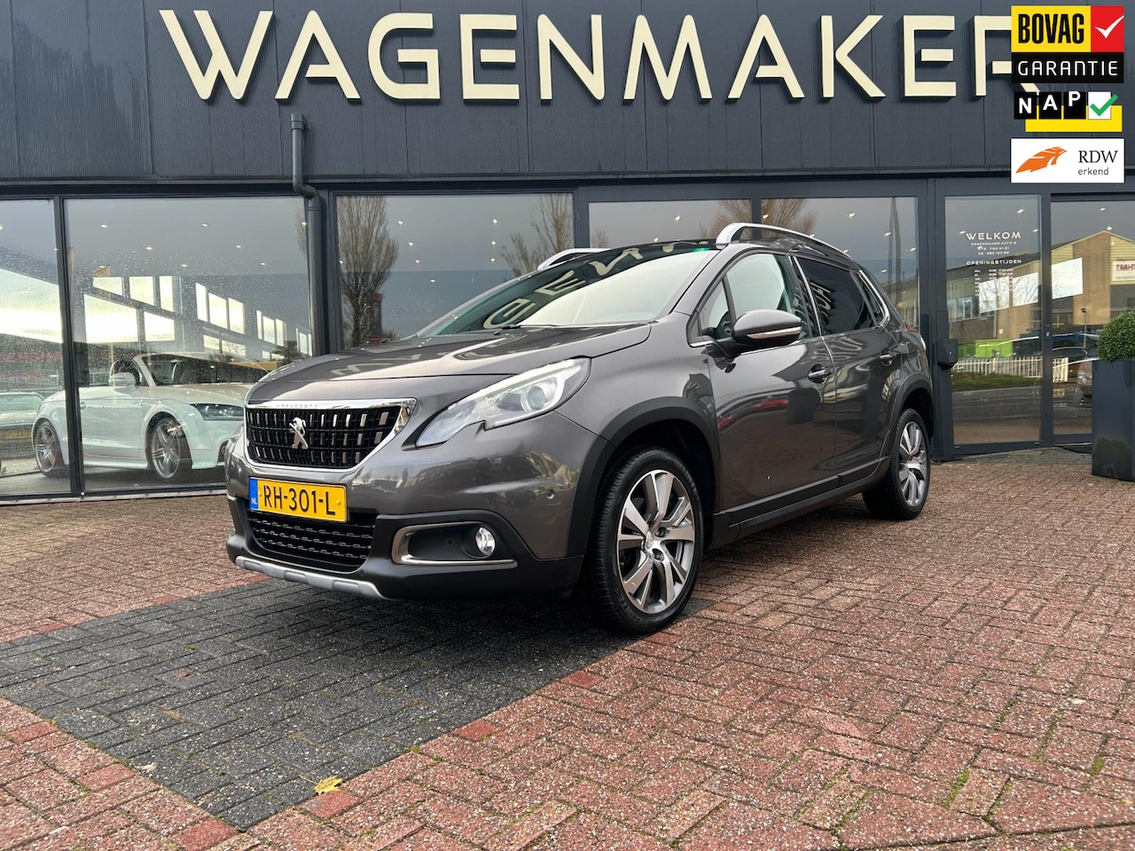 Peugeot 2008 - 1.2 PureTech Allure NAVI|CAM|PANO|Carplay|DealerOH - AutoWereld.nl