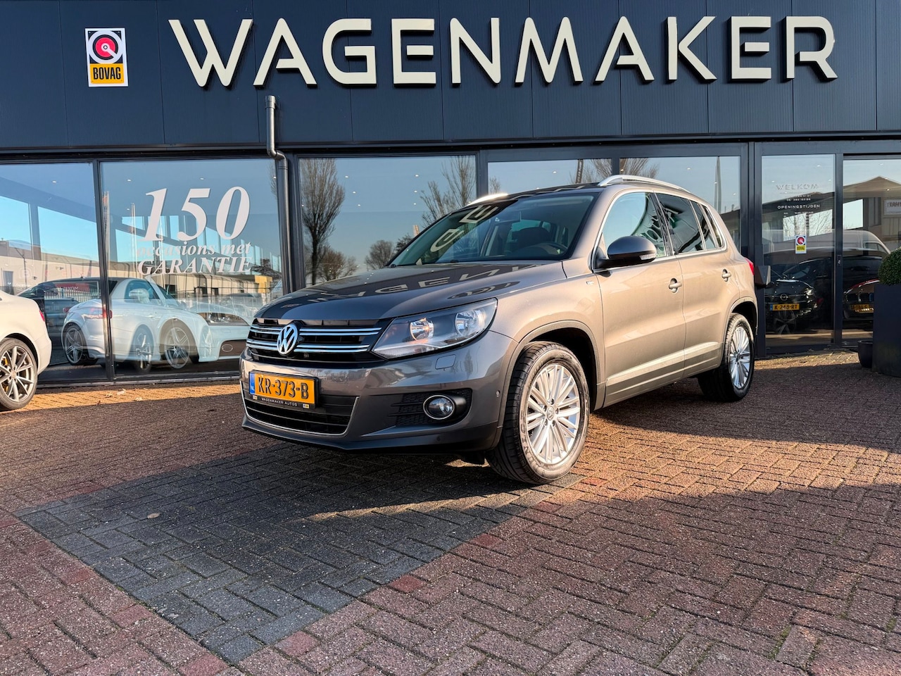 Volkswagen Tiguan - 1.4 TSI Sport&Style AUT|Navi|Cruise|CAMERA - AutoWereld.nl