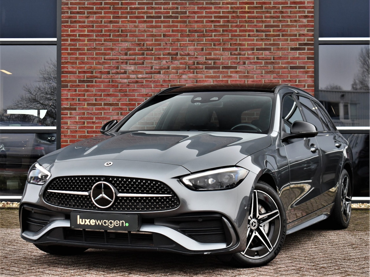 Mercedes-Benz C-klasse Estate - 300 e AMG Line Pano Trekh Distronic Night 360-cam - AutoWereld.nl