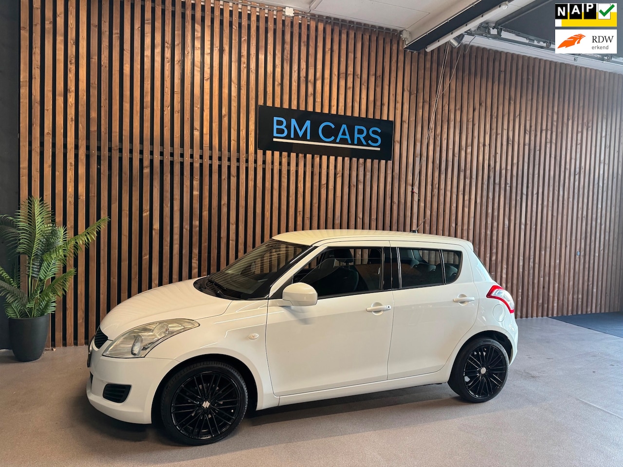 Suzuki Swift - 1.2 Comfort EASSS Airco, Parkeersensoren,NAP - AutoWereld.nl