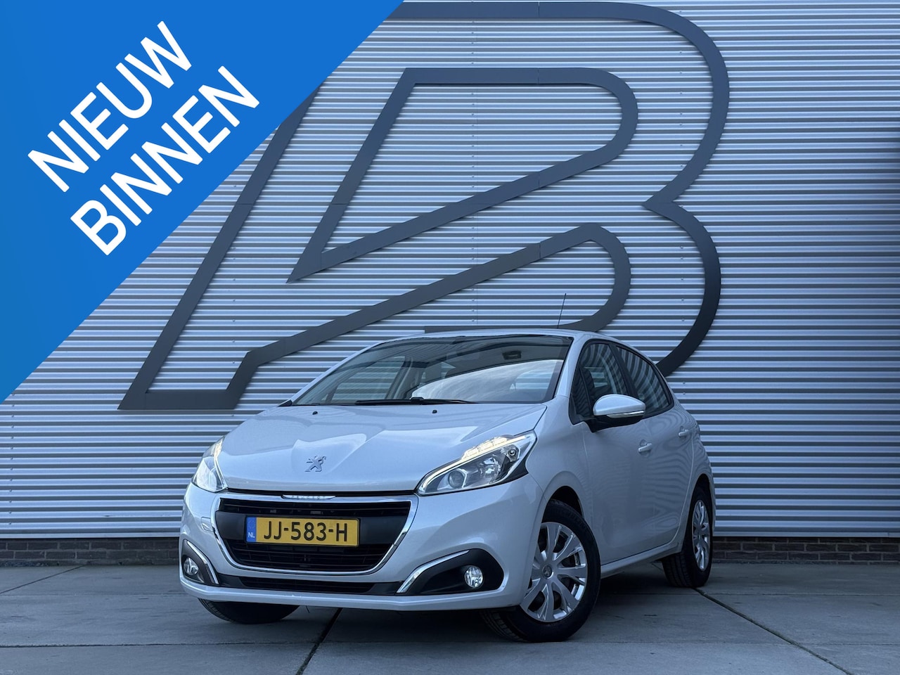 Peugeot 208 - 1.2 PureTech Blue Lion 2e Eigenaar|Navi|Carplay|Airco|Cruise|PDC|N.A.P|Nieuwe APK bij Afle - AutoWereld.nl