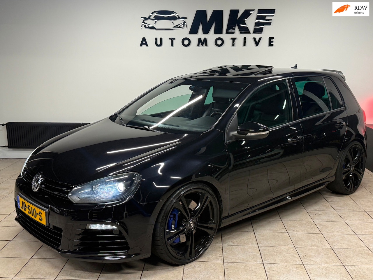Volkswagen Golf - 2.0 R 4-Motion 5D 2010 Zwart ECC/DAKJE/LEER! - AutoWereld.nl
