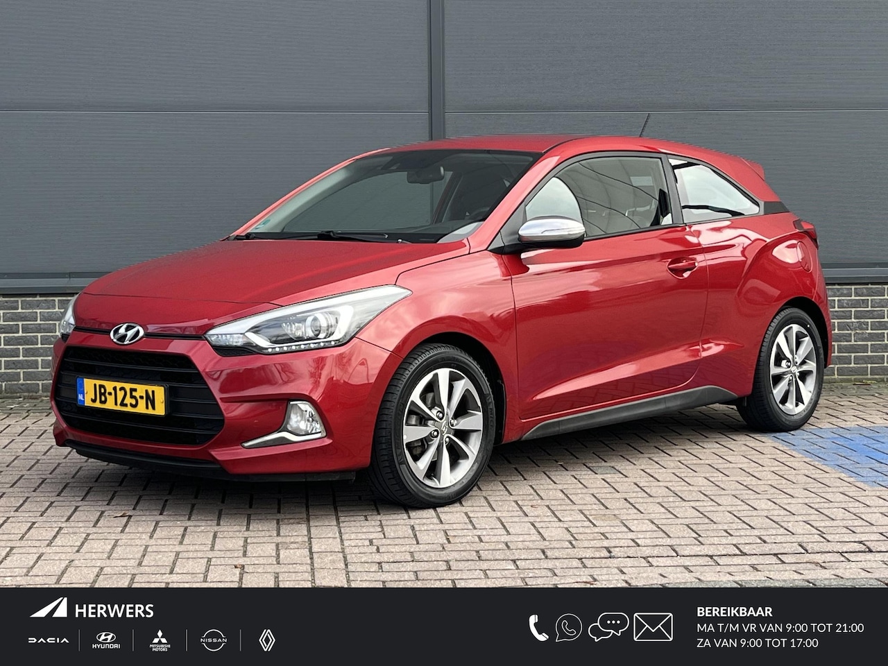 Hyundai i20 Coupé - 1.2 HP i-Motion Comfort / Navigatie / Climate Control / Cruise Control / Camera / Regensen - AutoWereld.nl