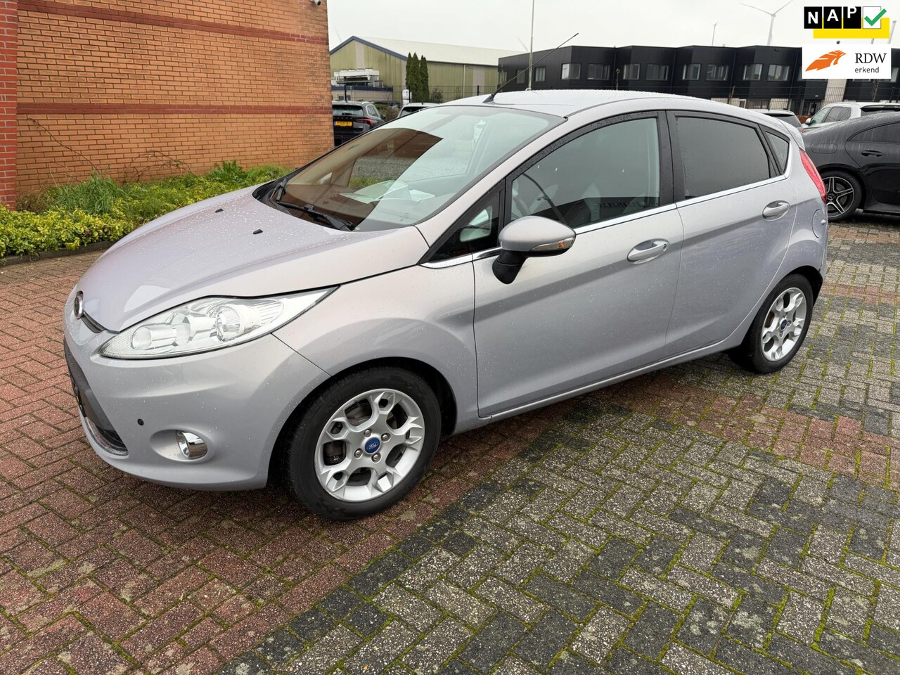 Ford Fiesta - 1.6 TDCi ECOnetic Titanium 1.6 TDCi ECOnetic Titanium, Leder, Navi, Trekhaak, PDC V+A - AutoWereld.nl