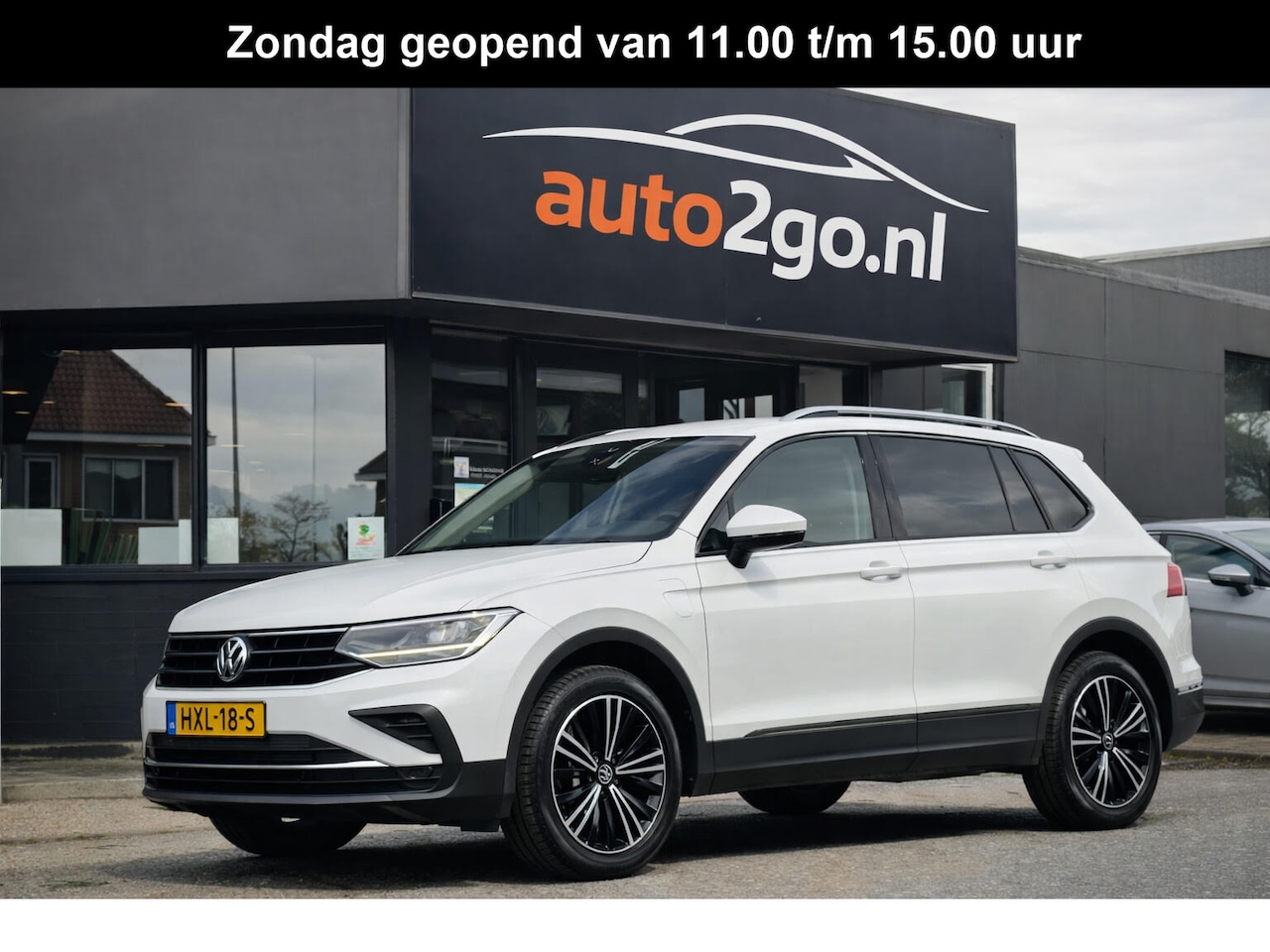 Volkswagen Tiguan - 1.4 TSI AUT6 eHYBRID R-LINE VOL-LEDER DIGI-DASH AIRCO IQ-DRIVE PARK-ASSIST LED LMV PDC - AutoWereld.nl
