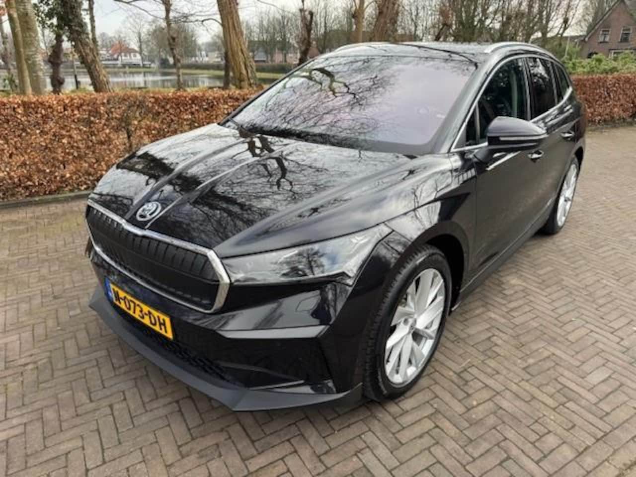 Skoda Enyaq iV - 80 First Edition 204PK SOH 93% Warmtepomp/Trekhaak/Leer/Acarplay/Led/Nav/Camera/Fabrieksga - AutoWereld.nl