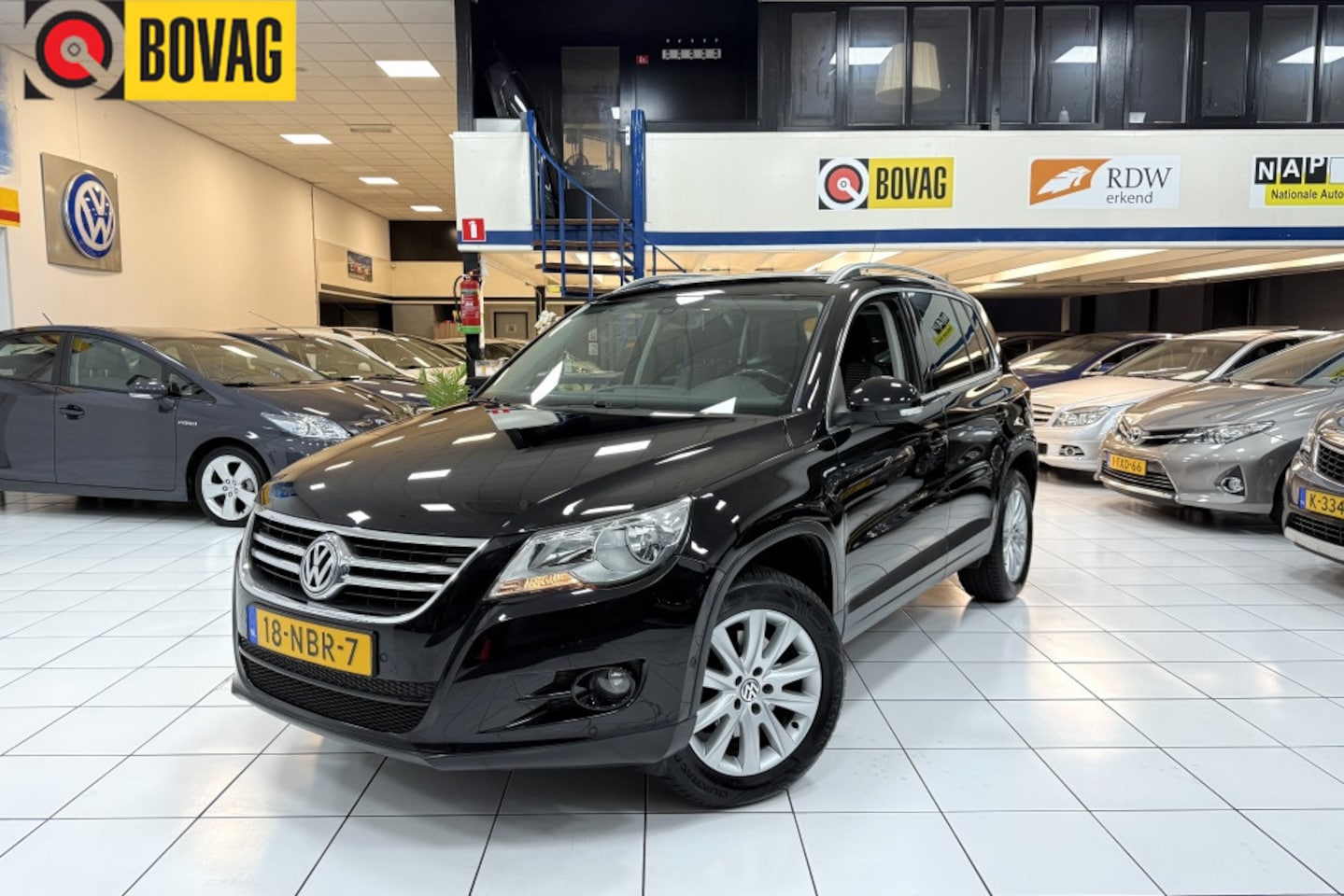 Volkswagen Tiguan - 1.4 TSI Sport&Style 1e Eigenaar Bovag Garantie Navi - AutoWereld.nl