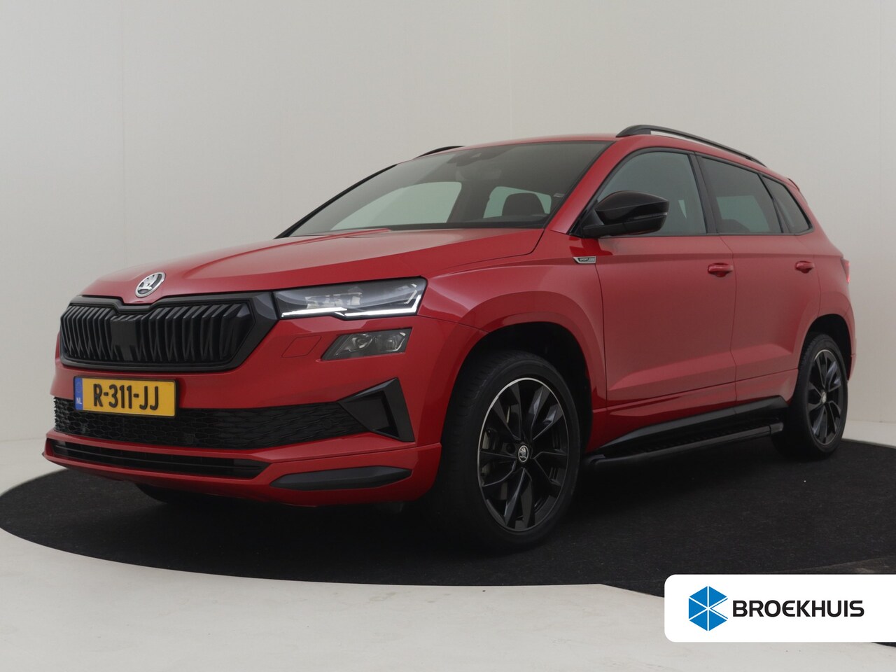Skoda Karoq - 1.5 TSI ACT Sportline Business 150 Pk DSG/AUTO | Trekhaak | Achteruitrijcamera | Navigatie - AutoWereld.nl