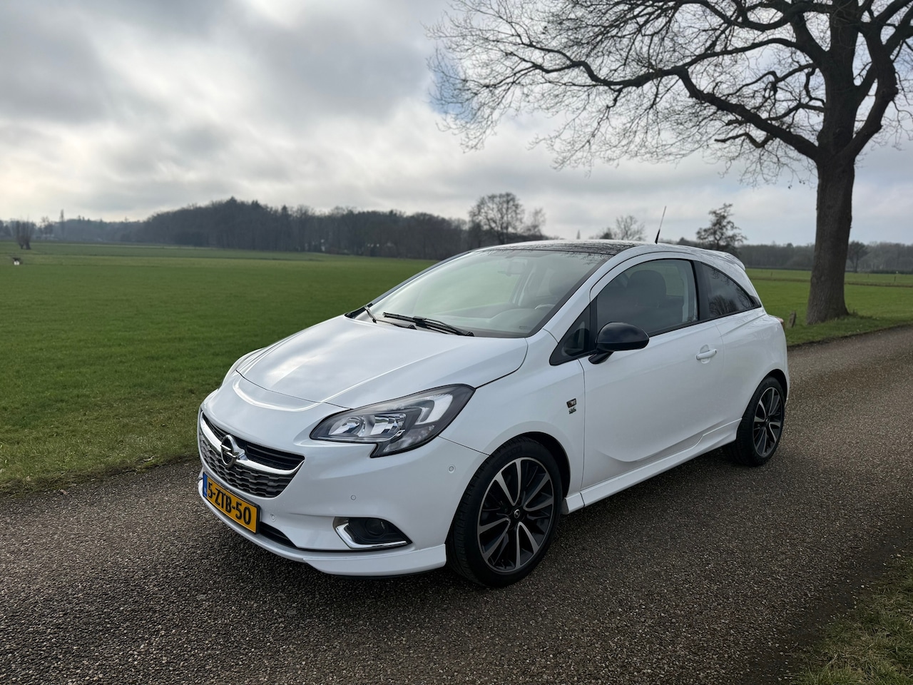 Opel Corsa - 1.4 OPC LINE / CRUISECONTROL / AIRCO / PARKEERSENSOREN - AutoWereld.nl