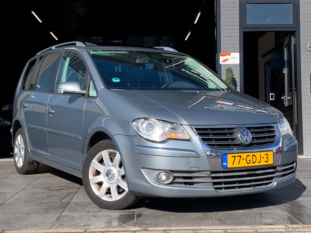 Volkswagen Touran - 1.4 TSI Highline|AUT|Schuifdak|Trekhaak - AutoWereld.nl
