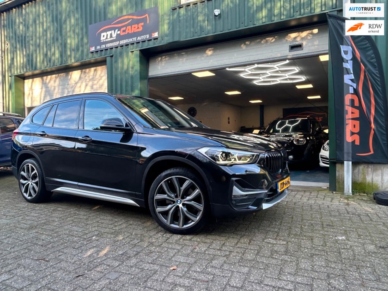BMW X1 - SDrive20i High Executive Pano Leder Navi pro - AutoWereld.nl