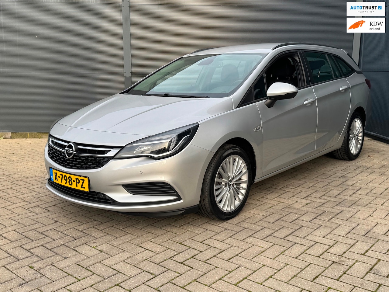 Opel Astra Sports Tourer - 1.4i / Navi / Pdc - AutoWereld.nl
