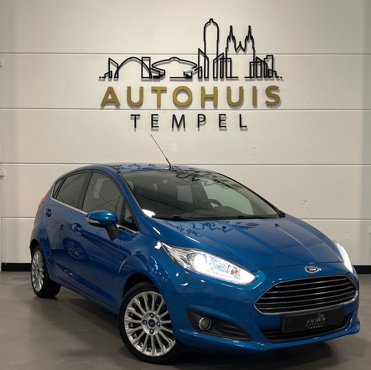 Ford Fiesta - 1.0 EcoBoost Titanium Nap Airco Led Cruise Climate Trekhaak Parkeersensoren - AutoWereld.nl