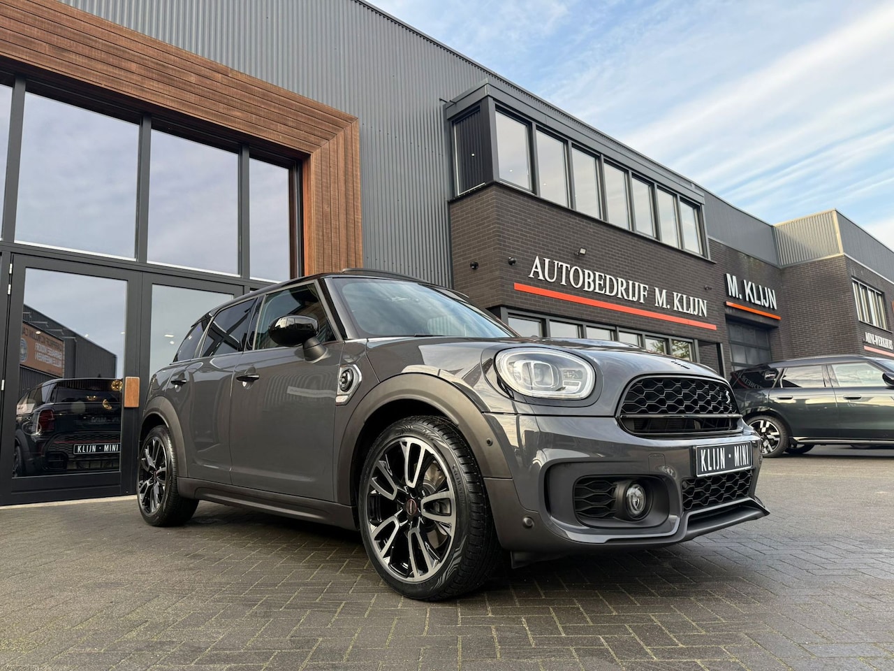 MINI Countryman - Mini 1.5 Cooper S E ALL4 John Cooper Works 220pk/Pano/Hk/19"Jcw/Np:61.000,- - AutoWereld.nl