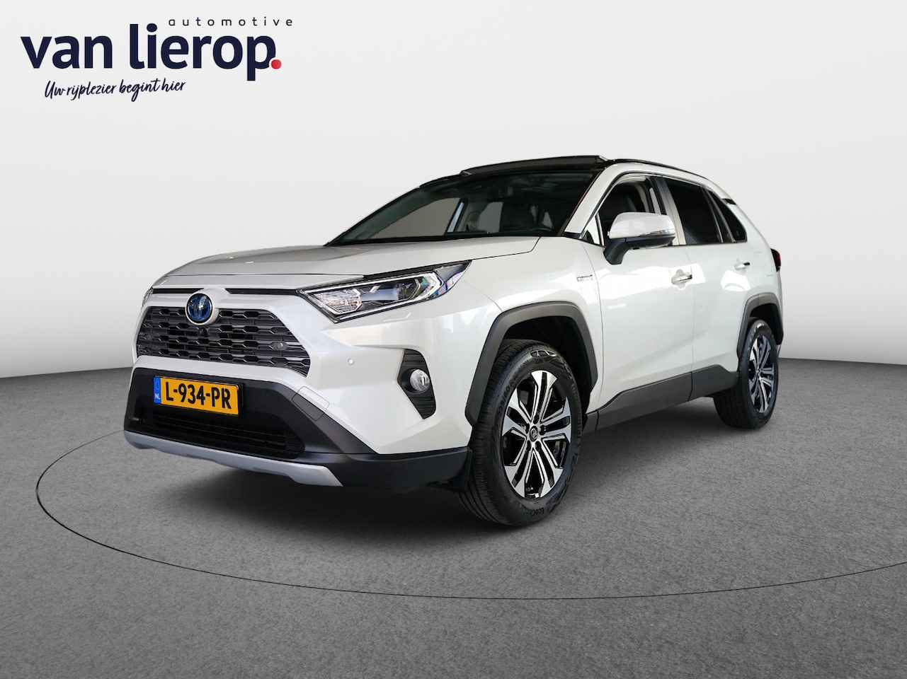 Toyota RAV4 - 2.5 Hybrid AWD PANO | TREKHAAK | PARELMOER WIT - AutoWereld.nl