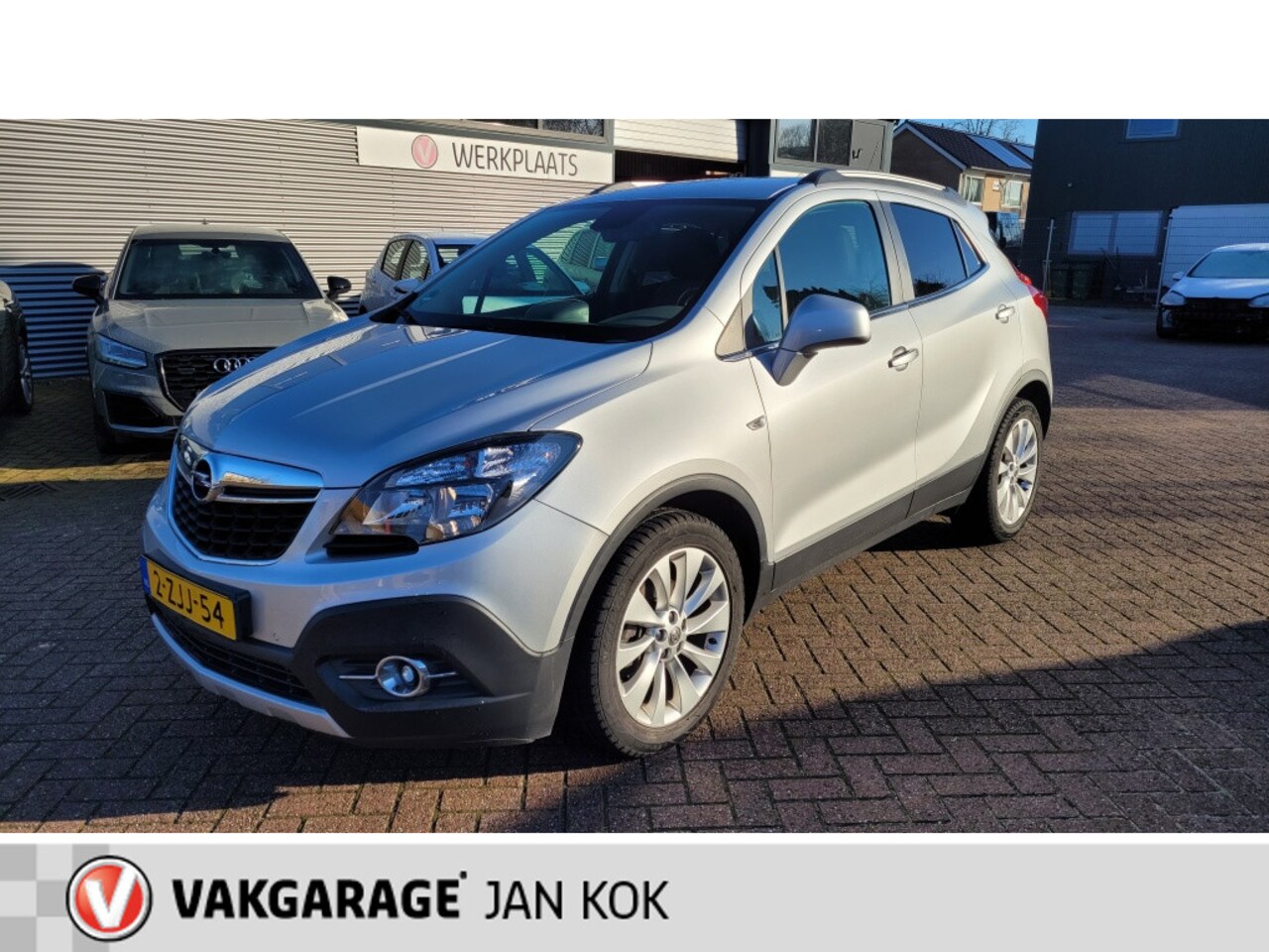 Opel Mokka - 1.4 T Cosmo 1.4 T Cosmo, navi, trekhaak, aur camera. - AutoWereld.nl