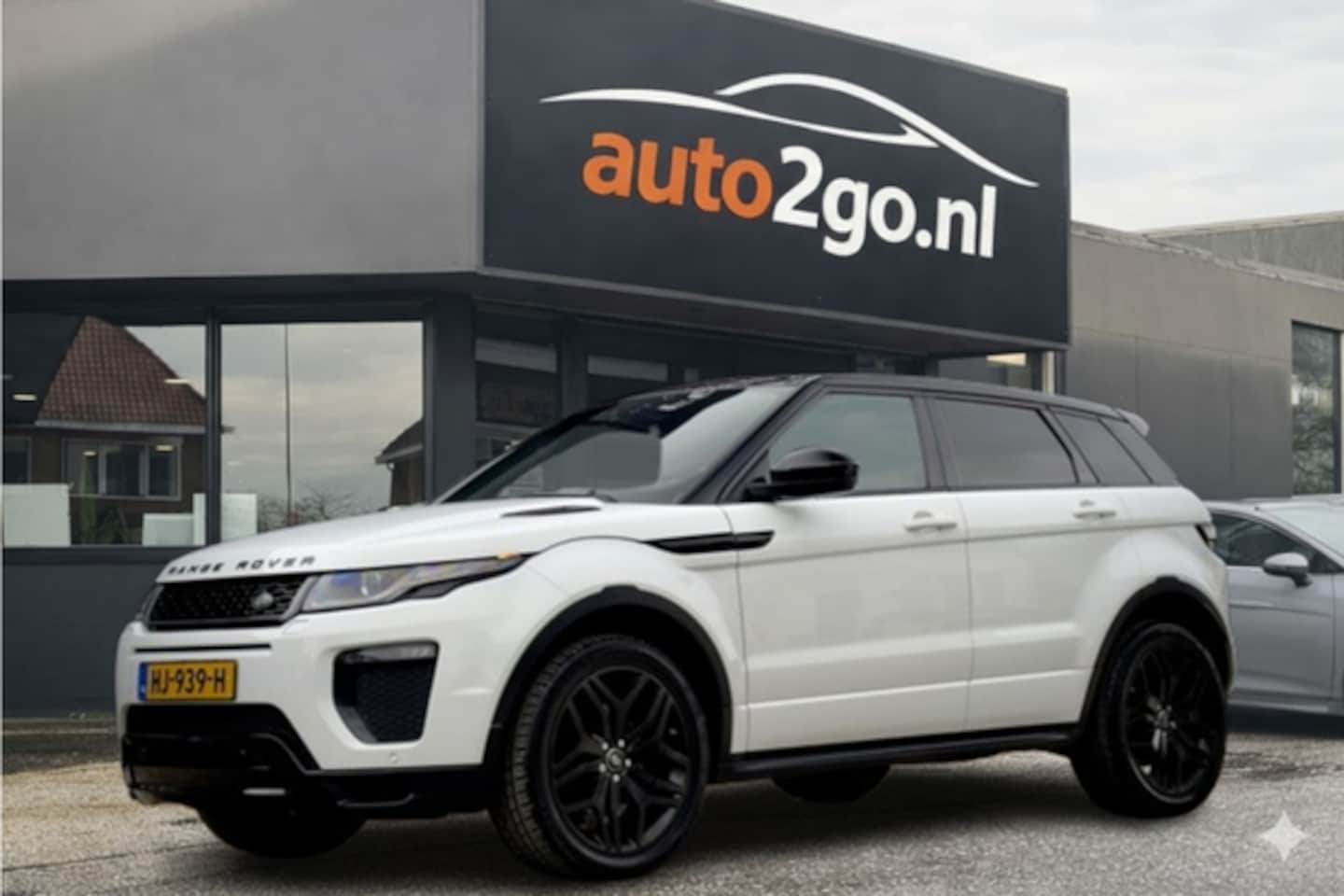 Land Rover Range Rover Evoque - 2.0 Si4 AUT9 AUTOBIOGRAPHY PANODAK TWO-TONE-LEDER NAVI AIRCO LED LMV PDC - AutoWereld.nl