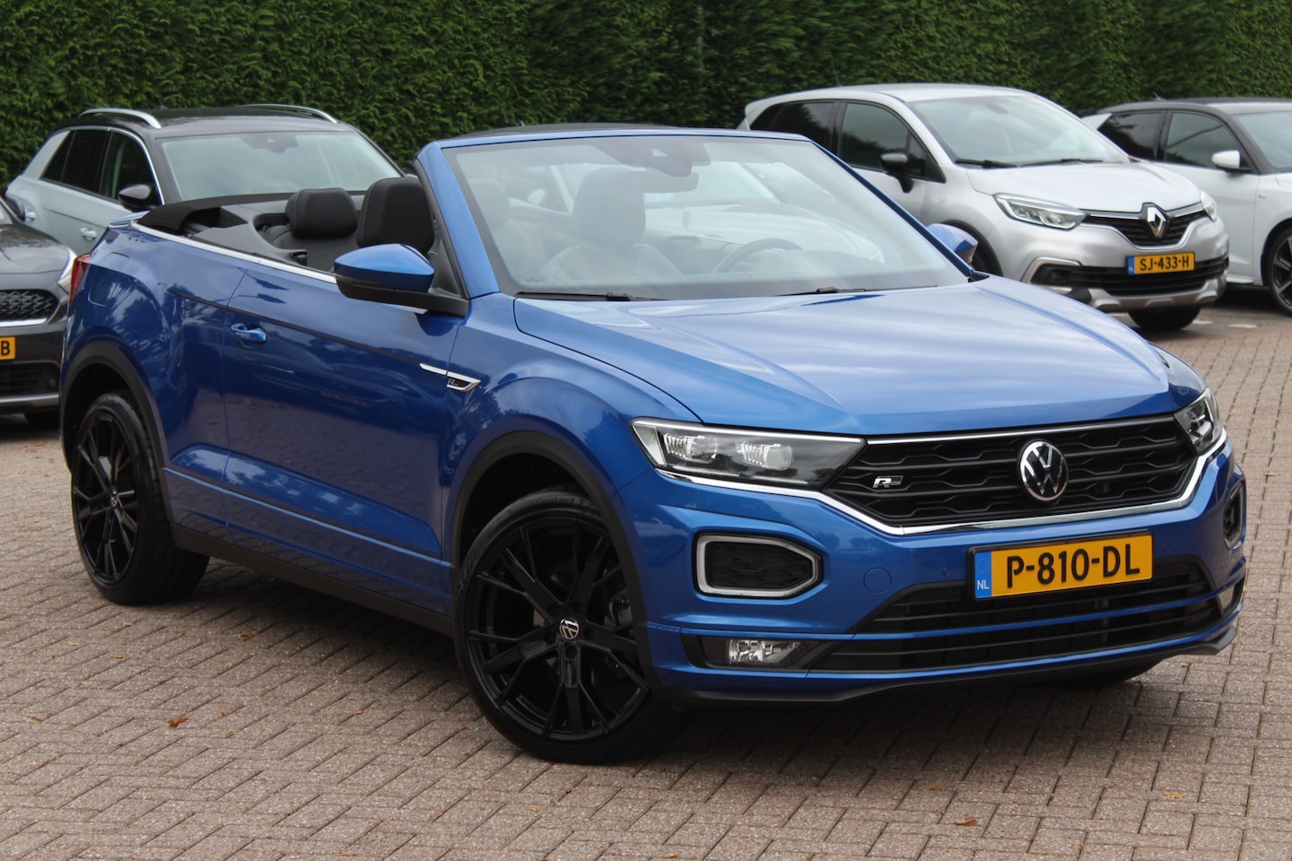 Volkswagen T-Roc Cabrio - 1.5 TSI R-Line / Navigatie / Parkeerhulp V+A / 19'' / Keyless / ACC / DAB / Stoelverwarmin - AutoWereld.nl