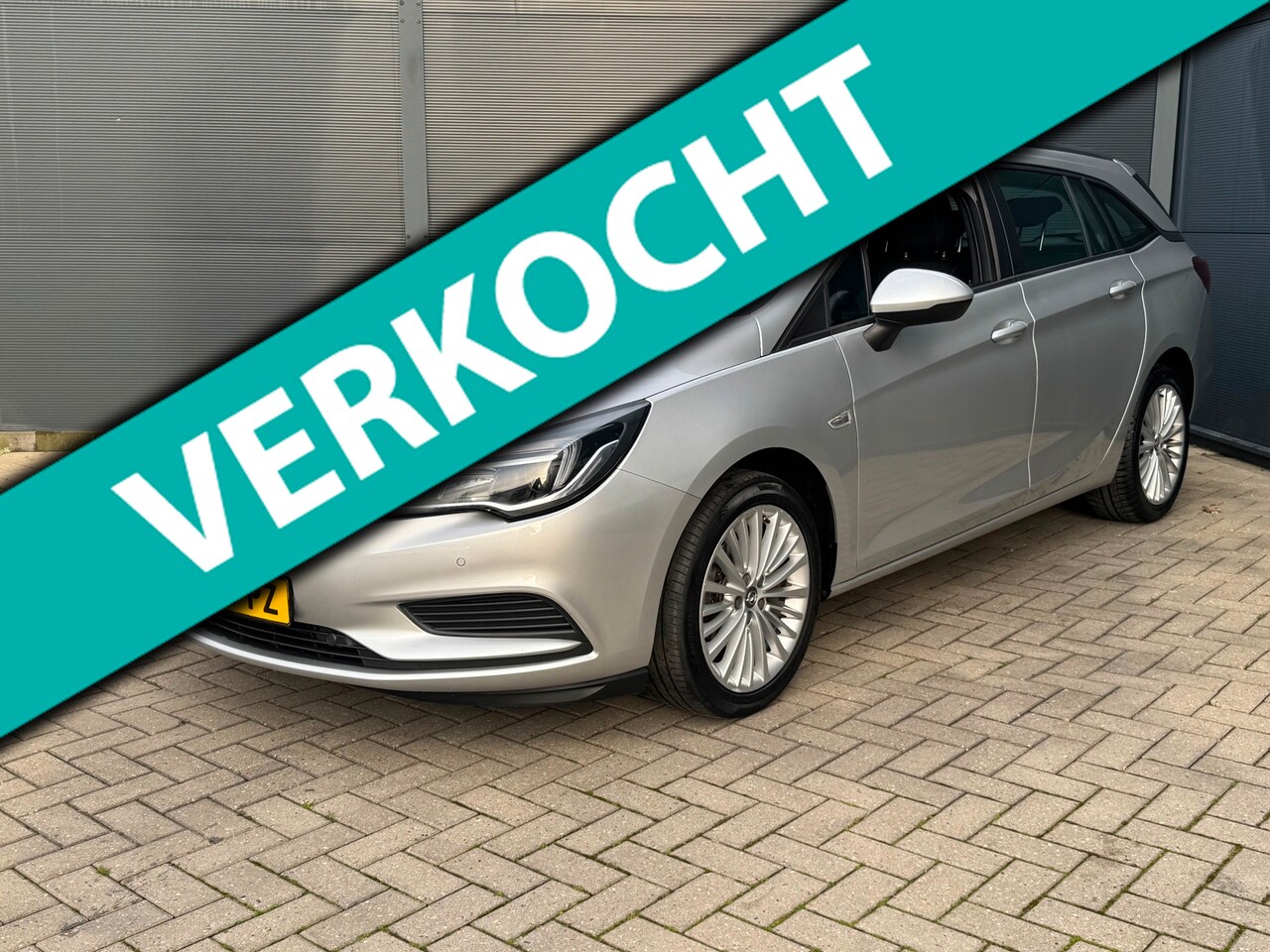 Opel Astra Sports Tourer - 1.4i / Navi / Pdc - AutoWereld.nl