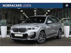 BMW X1 - sDrive18i M Sport Automaat / M Adaptief onderstel / Sportstoelen / Comfort Access / Achter