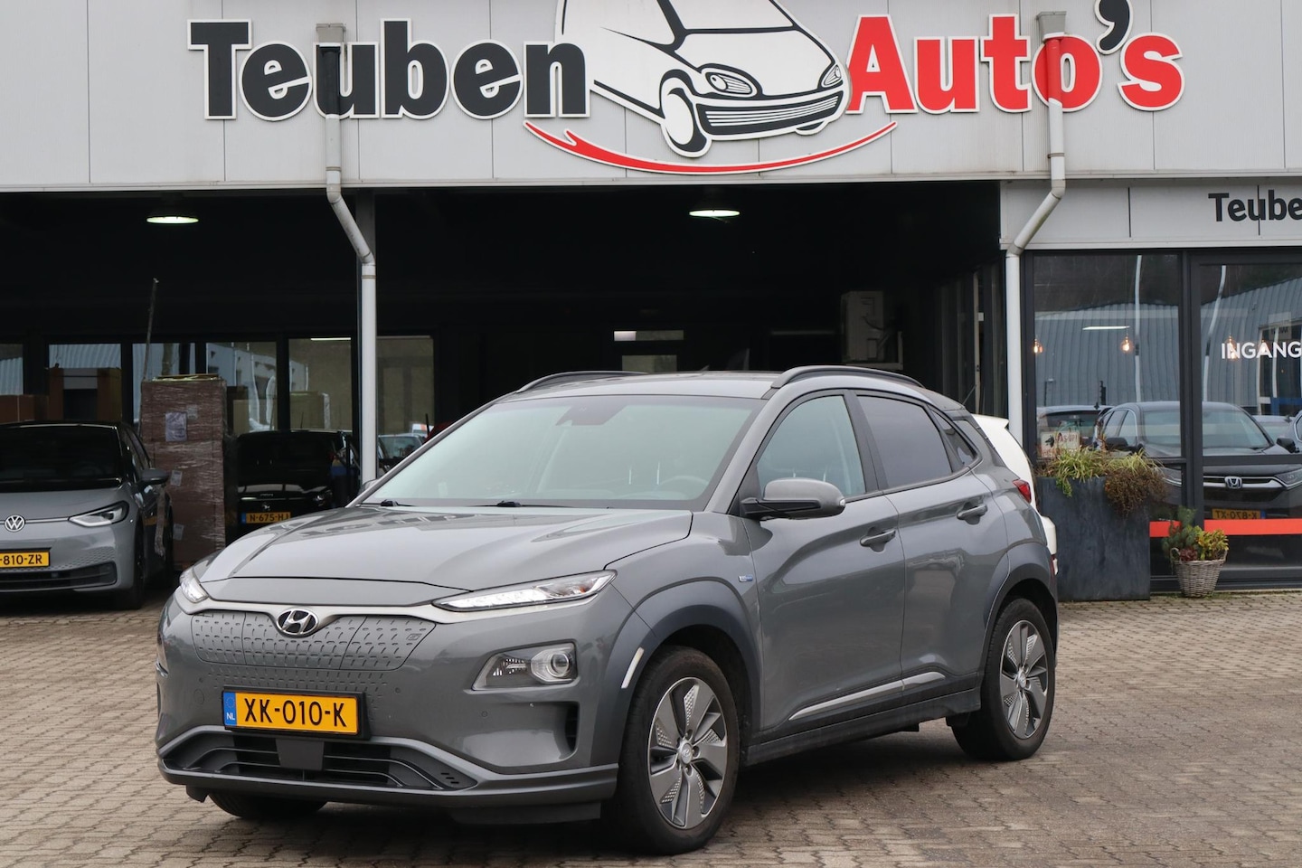 Hyundai Kona Electric - EV Premium 64 kWh SOH 93%, Electromotor maakt lawaai, Stoel- en stuurverwarming, Climate c - AutoWereld.nl