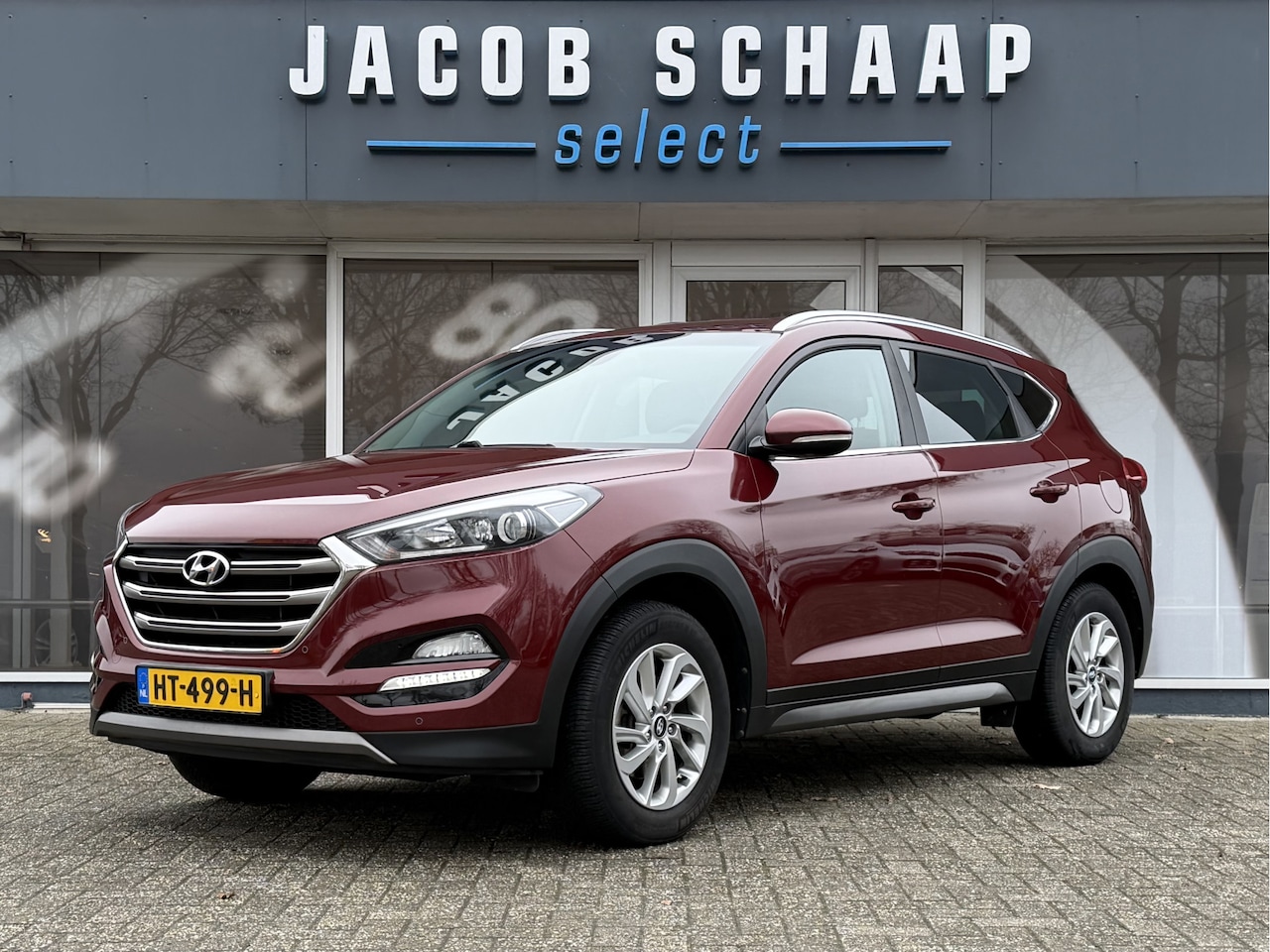 Hyundai Tucson - 1.6 GDi Comfort / Navi / PDC + Camera achter / 17" LM / Trekhaak - AutoWereld.nl