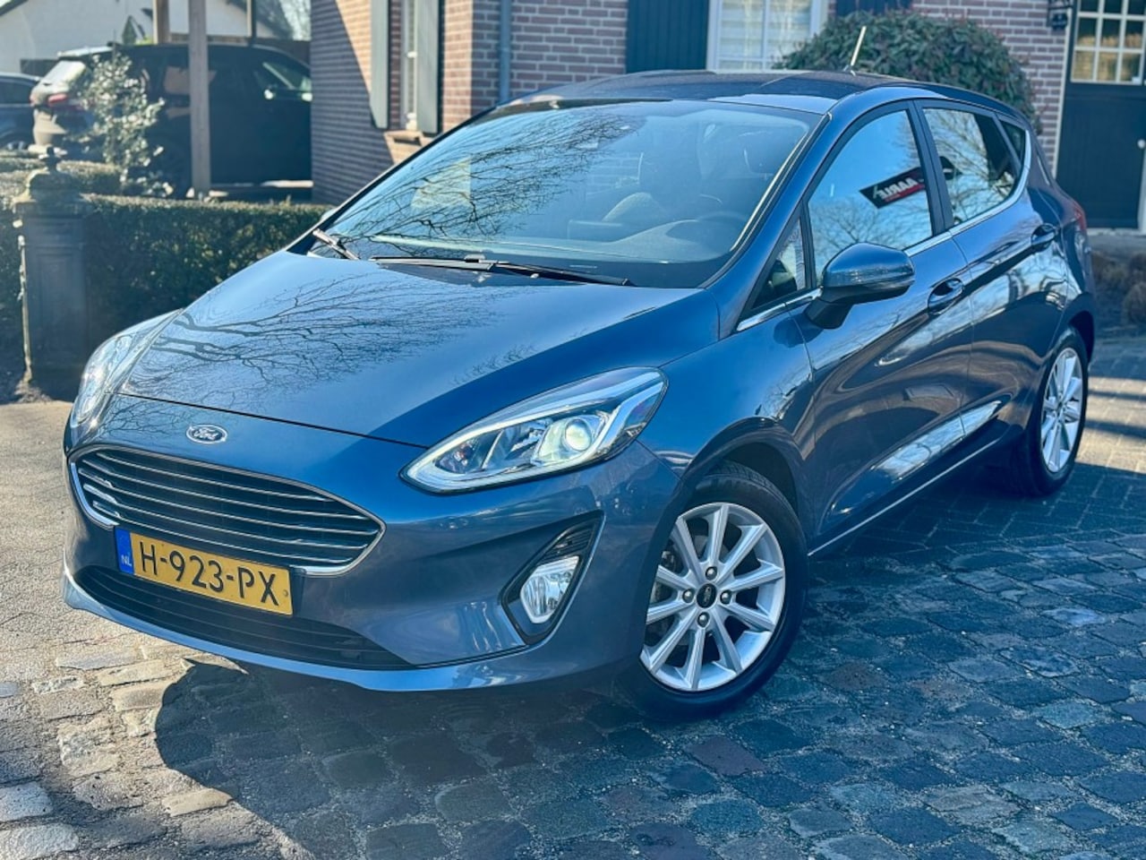 Ford Fiesta - 1.0 95pk Titanium ecc,lmv,navigatie,pdc - AutoWereld.nl
