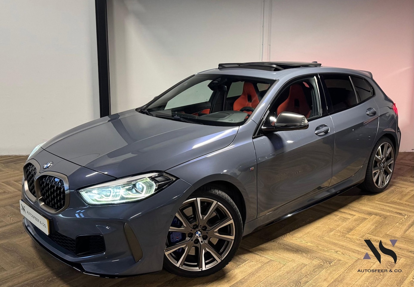 BMW 1-serie - M135i xDrive High Executive Edition PANO KEYLESS CAM - AutoWereld.nl