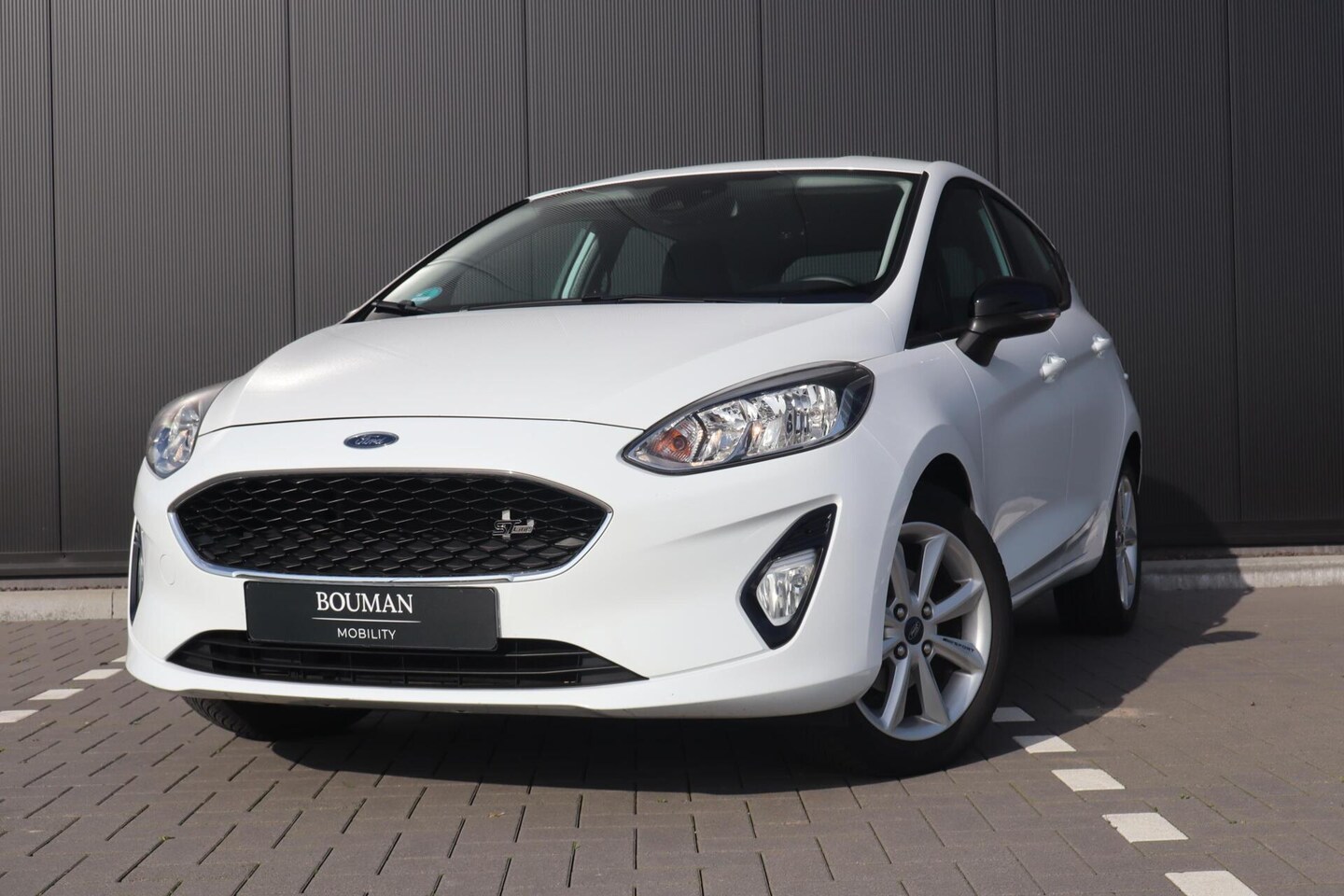 Ford Fiesta - 1.1 BLACK PACK, CARPLAY, CRUISECONTROL, PDC, LANE ASSIST - AutoWereld.nl