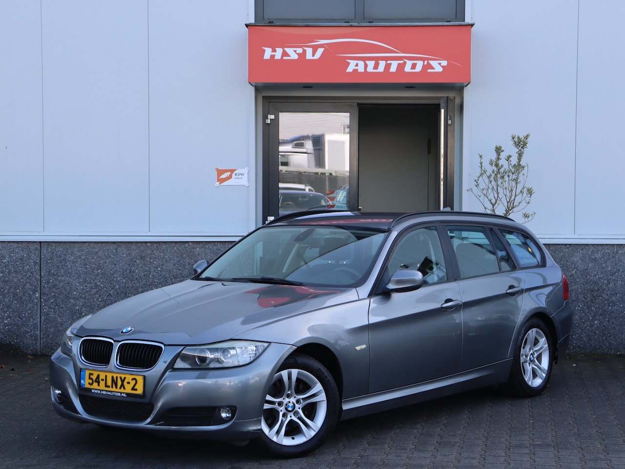BMW 3-serie Touring - 318i Business Line navi LM airco *apk 02-2027* - AutoWereld.nl